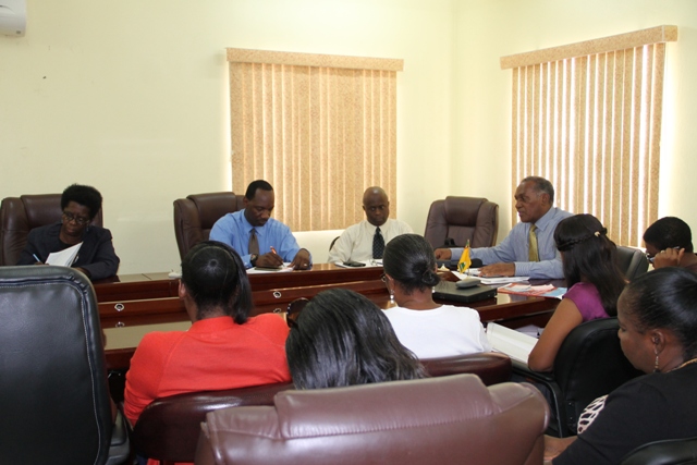 Premier of Nevis and Minister of Education Hon. Vance Amory (at the head of the table) addressing head teachers on Nevis at a meeting at the Ministry of Finance conference room on July 21, 2015. He is flanked by Permanent Secretary in the Premier’s Ministry Wakely Daniel (left), Assistant Secretary Kevin Barett (second from left) and Principal Education Officer Palsy Wilkin (to his right)